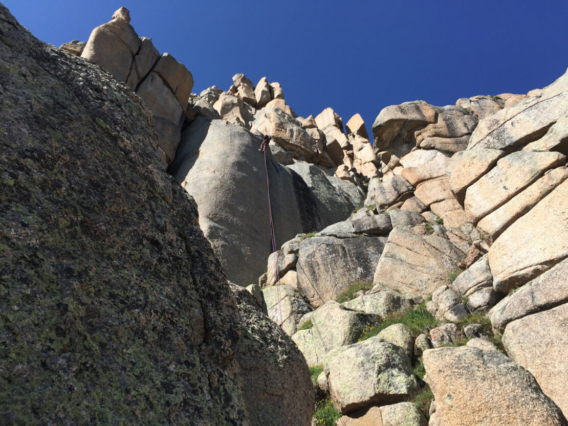 Climber rappelling off of Jagged Mountain